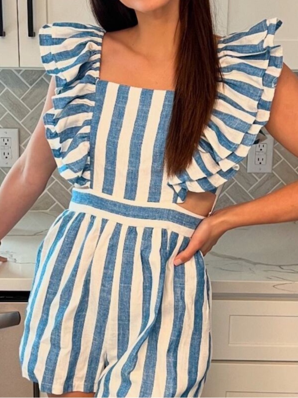 Shop Neighbor Striped Blue & White Ruffle Sleeve Romper with tie-back details
